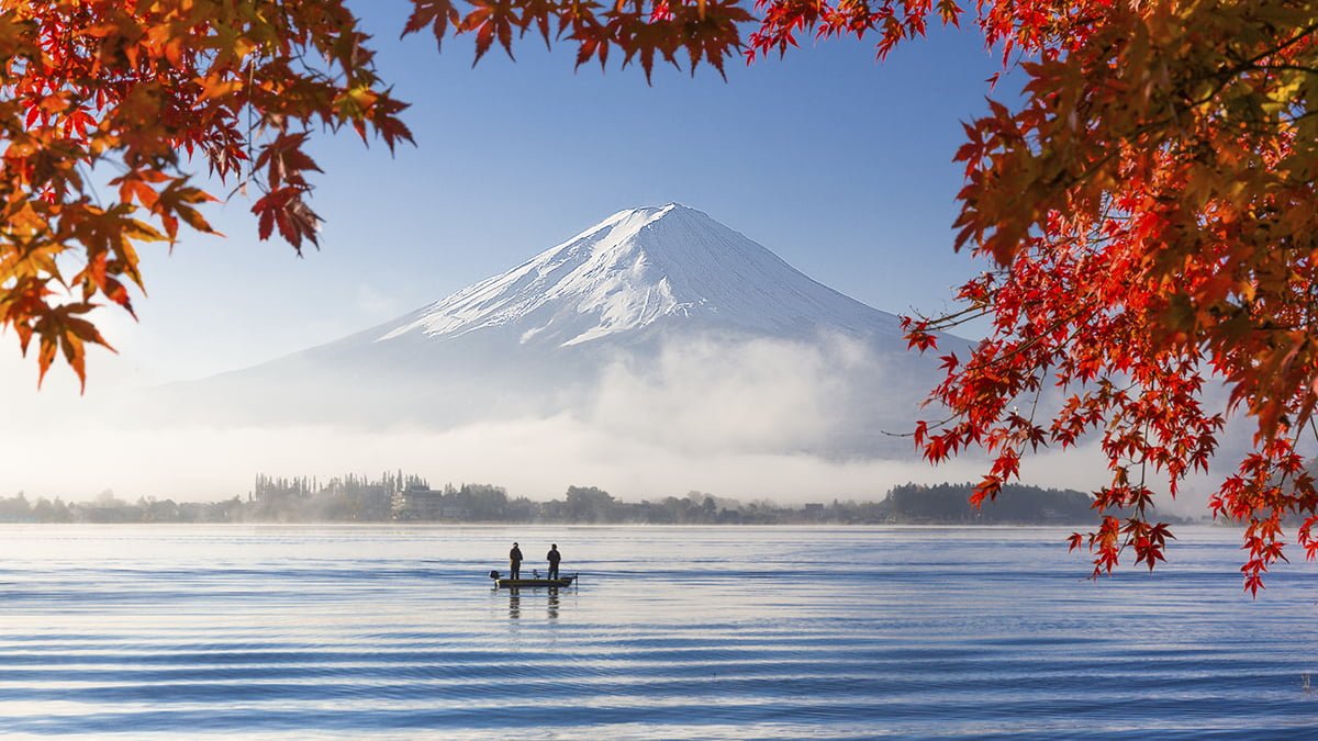 Fuji and red maple leaves at japan lake